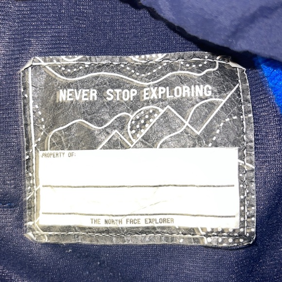 The North Face blue and black full zip jacket size 7/8 stain on front bottom - Picture 6 of 6